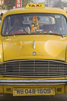 Images Dated 9th November 2008: Yellow Ambassador taxi outside Howrah train station, Kolkata (Calcutta)