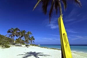 Yellow canoe at the white sand beach of Playa del Este, Cuba, West Indies