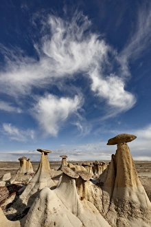 San Juan Basin Prints: Yellow hoodoos under a wispy cloud