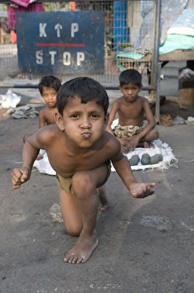 Boys Prints: Young boys in the slums of Kolkata (Calcutta), West Bengal, India, Asia