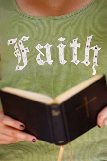 Images Dated 11th August 2009: Young Christian reading the Bible, Saint-Gervais, Haute Savoie, France, Europe