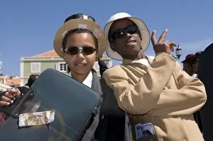 Young men dressed as businesspeople during Carnival, Mindelo, Sao Vicente