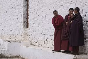 Young monks having a chat at the Paru Tsong a fortified monastery, Paru, Bhutan, Asia