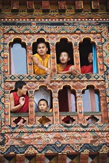Teenagers Prints: Young monks at a window, Chimi Lhakhang dating from 1499