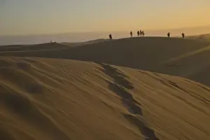 Kids Prints: Young people watching the sunset at Maspalomas sand dunes