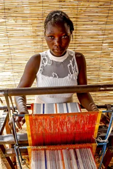 Females Prints: Young weaver in Koudougou, Burkina Faso, West Africa, Africa