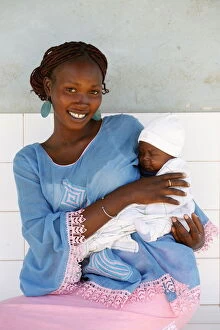Images Dated 4th August 2000: Young woman carrying her baby, Garage-Bentenier, Thies, Senegal, West Africa, Africa