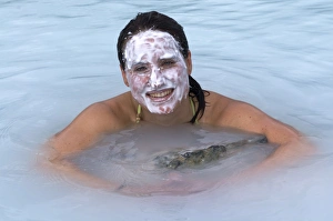 Images Dated 14th June 2009: Young woman enjoying bathing in hot spring, Blue Lagoon, Iceland, Polar Regions