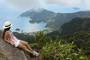 Shorts Prints: Young woman looking out over the Green Coast (Costa Verde) from Papapagaio peak