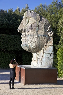 Camera Prints: Young woman taking photograph of the Monumental Head, by Igor Mitora, Boboli Gardens