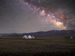Stars Prints: Yurts illuminated by the Milky Way in the Song Kol Lake area, Kyrgyzstan