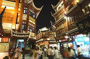 Yuyuan (Yu yuan) Garden Bazaar buildings founded by Ming dynasty Pan family illuminated in the Old Chinese city district, Shanghai