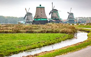 North Holland Prints: Zaanse Schans, a museum village with Dutch houses and windmills in Zaandam, North Holland