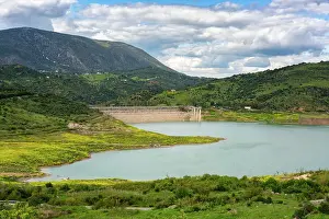 Fuel And Power Generation Prints: Zahara de la Sierra water reservoir dam with turquoise water and mountains in the background