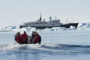 Zodiac ferrying visitors to and from boat at Brown Bluff, Antarctic Peninsula